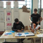A visitor is building the box with supervision